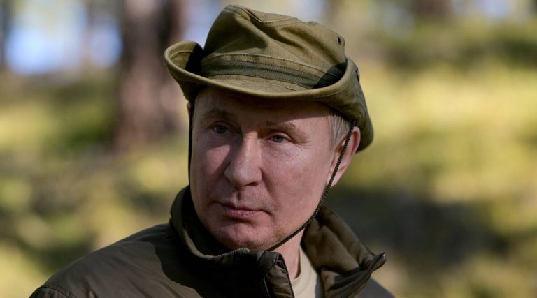 Caught on camera: Kremlin releases photos of Putin’s Siberian fishing trip