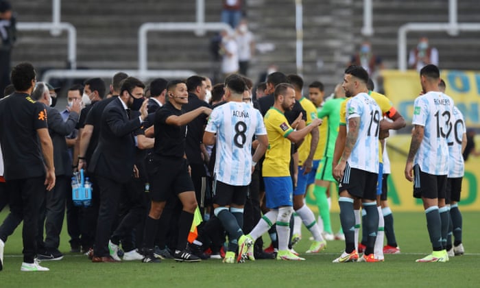 Brazil v Argentina abandoned as health authorities invade pitch