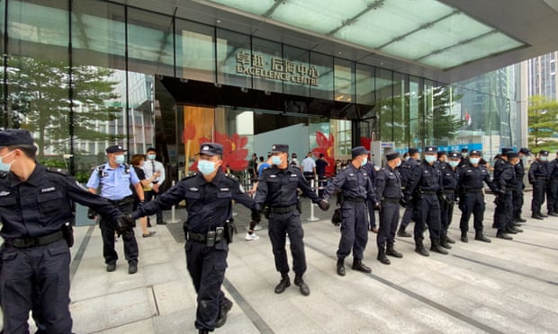 China property giant Evergrande admits debt crisis as protesters besiege HQ