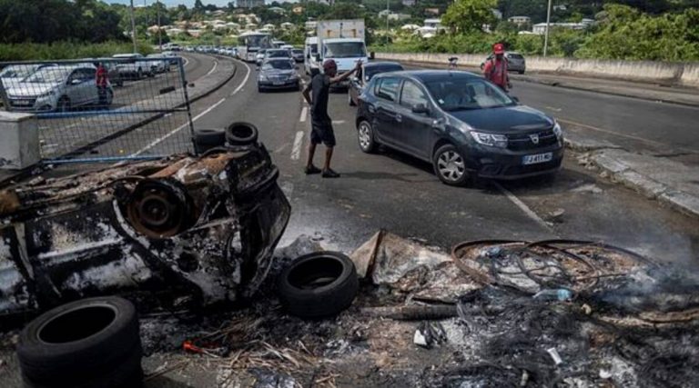 Looting and fires break out during Covid protests on France’s Martinique
